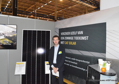 Voor de verandering de fotograaf op de foto, hier bij Pon Power in de stand voor het zonnepaneel Cat Solar.